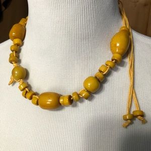 Adjustable necklace made of Brazilian beads vibrant yellow with earrings